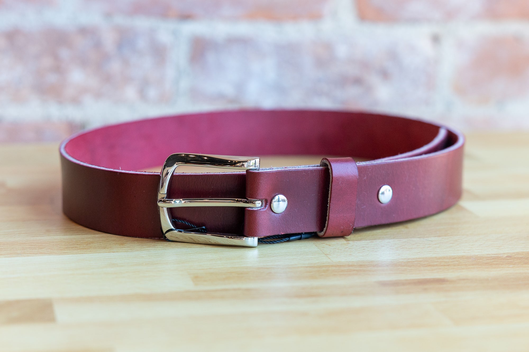 Red Leather Belt by Michael Borgwardt